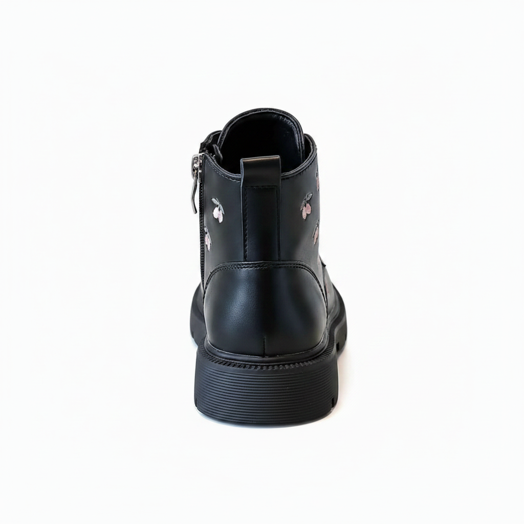 Black blossom kids winter boots for girls, angled view showing colour and shape
