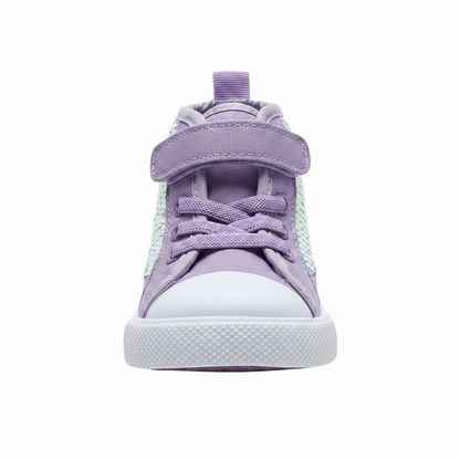 A high-top baby sneaker in lavender purple canvas with a white rubber toe cap and sole, featuring a large iridescent sequin panel on the side and a hook-and-loop strap closure.