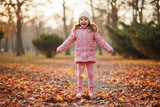 Young Girl at Park in Pink Princess Winter Boots